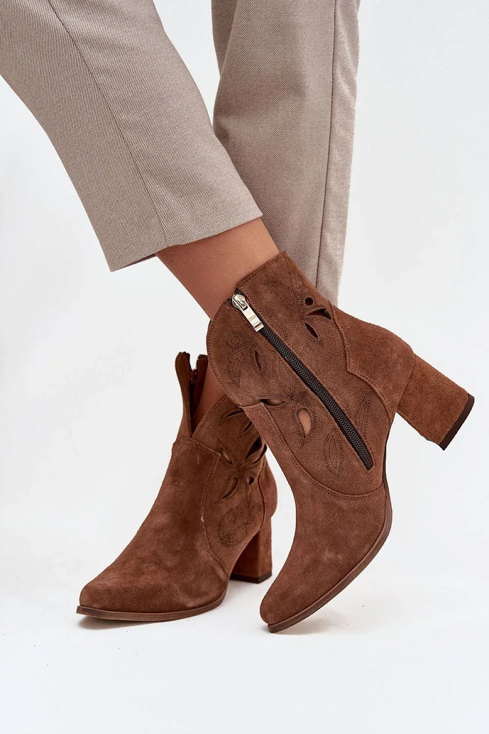 Heel boots Step in style