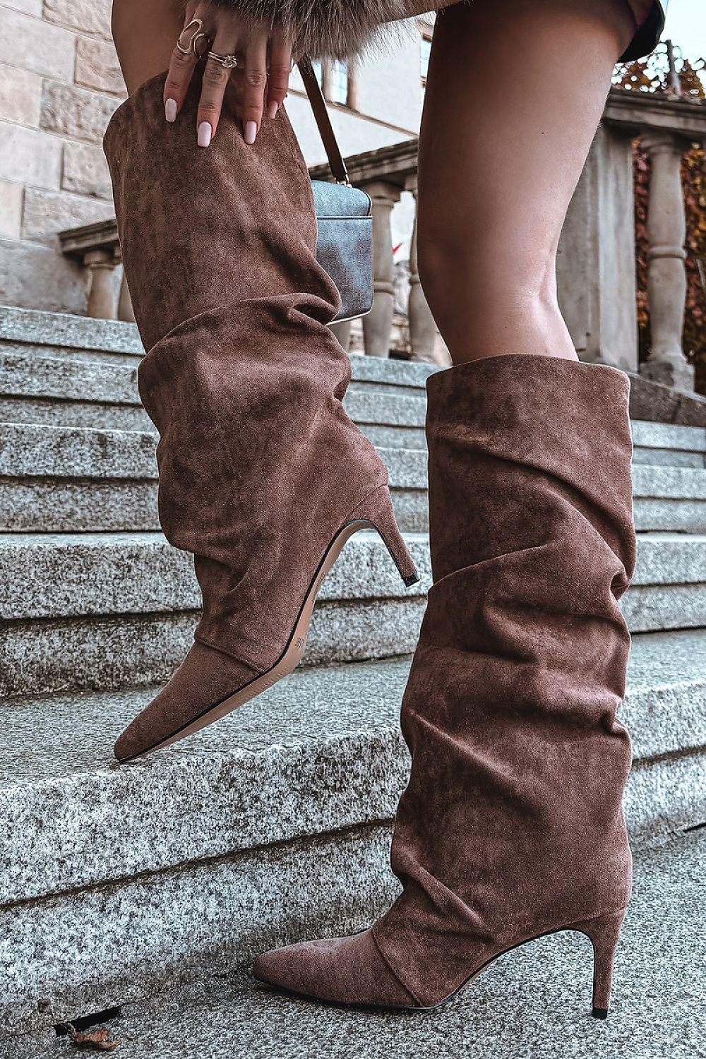 Heel boots Step in style